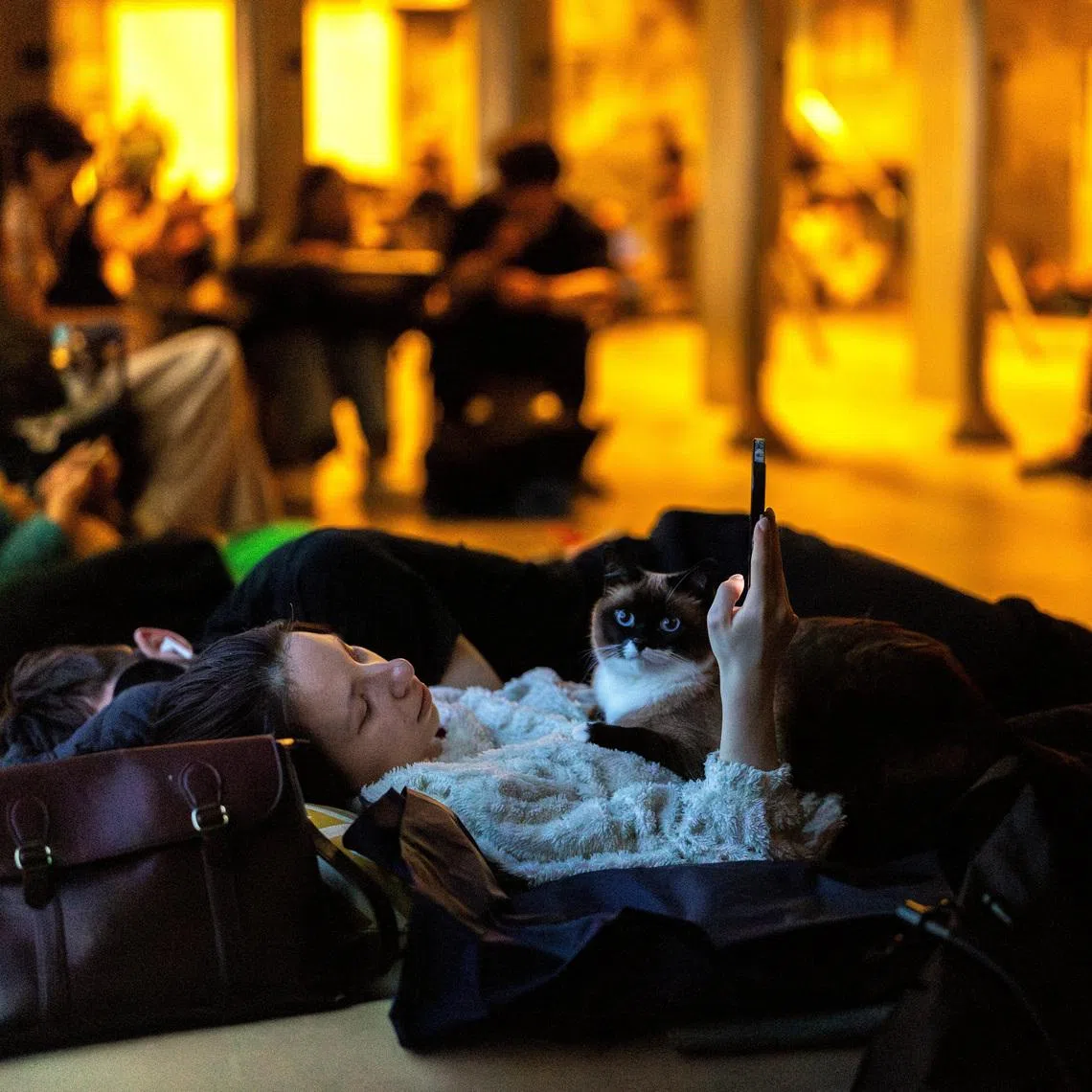People shelter in a metro station during Russian missile and drone attacks, amid Russia's attack on Ukraine, in Kyiv, Ukraine, May 24, 2026. REUTERS/Thomas Peter