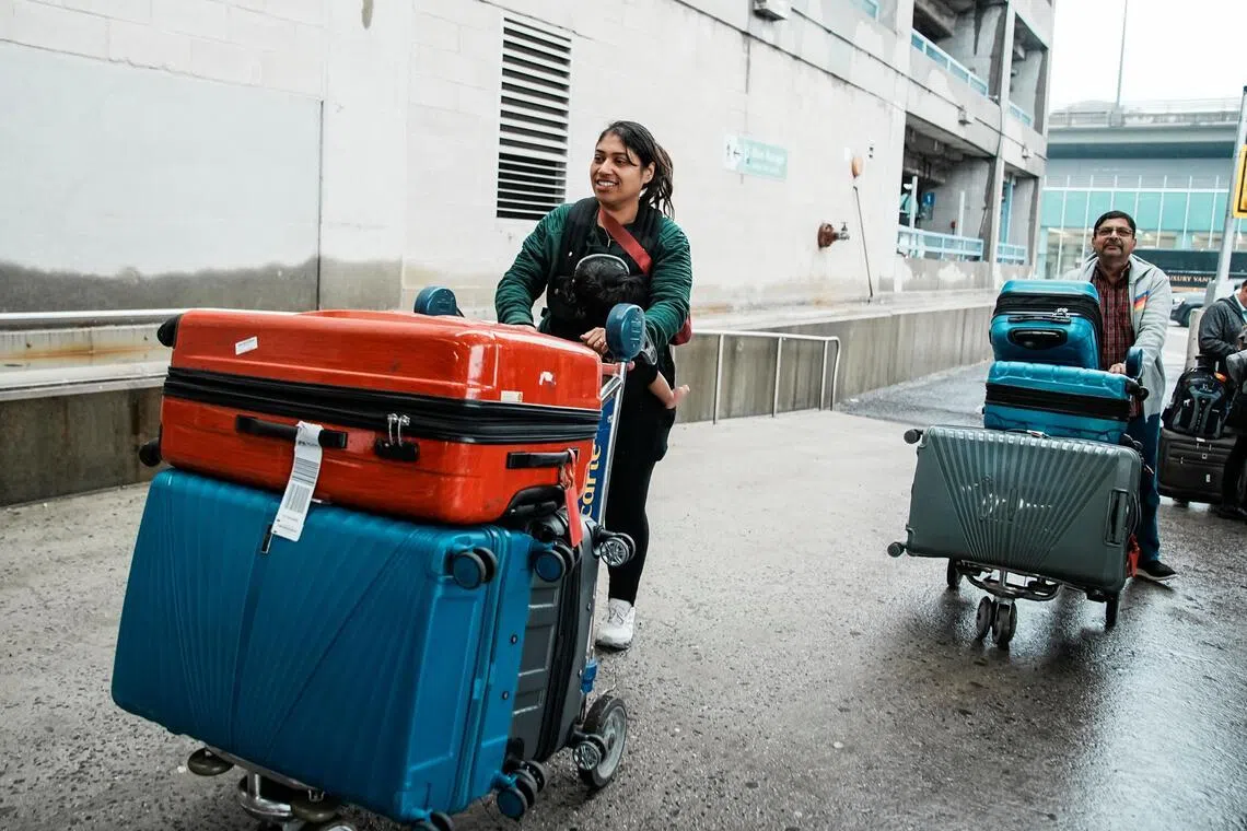 People arriving back in the US via a
government chartered flight on March 5.