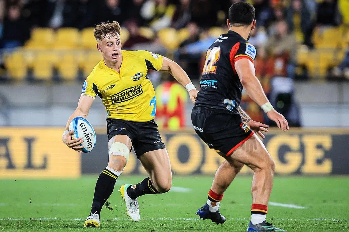 The Wellington Hurricanes' Ruben Love runs with the ball in the Super Rugby Pacific semi-final against the Waikato Chiefs on June 15, 2024.