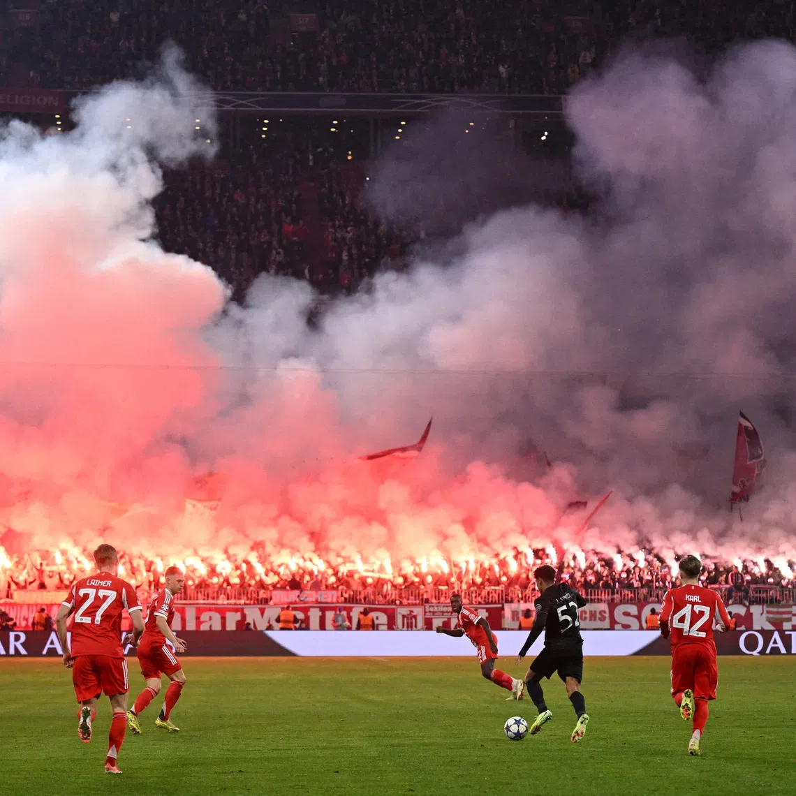 FILE PHOTO: Soccer Football - UEFA Champions League - Bayern Munich v Sporting CP - Allianz Arena, Munich, Germany - December 9, 2025 Sporting CP's Joao Simoes in action as Bayern Munich fans are seen with flares and banners in the stands REUTERS/Angelika Warmuth/File Photo