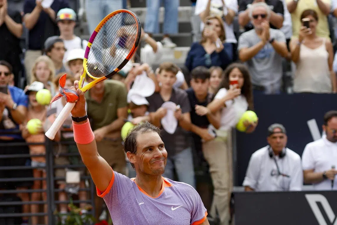 Rafael Nadal of Spain celebrates winning against Zizou Bergs of Belgium in the Italian Open first round.
