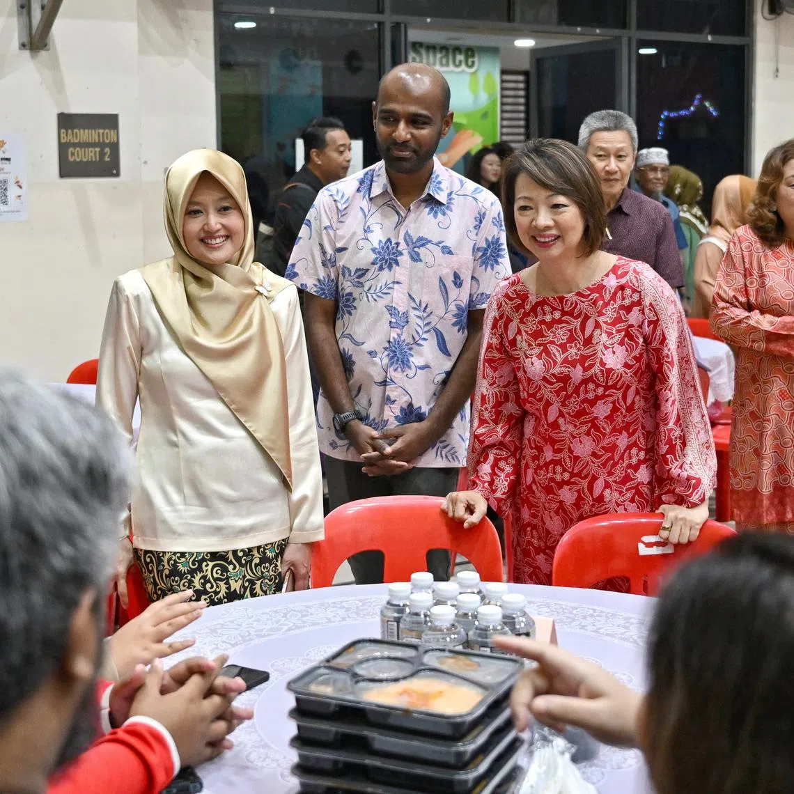 (From left) Minister of State for Health and Digital Development and Information Rahayu Mahzam, West Coast GRC MP Foo Mee Har, and Second Advisor to Jurong GRC Grassroots Organisations Dr Hamid Razak chatting with beneficiaries at Gek Poh Ville Community Club on March 23.