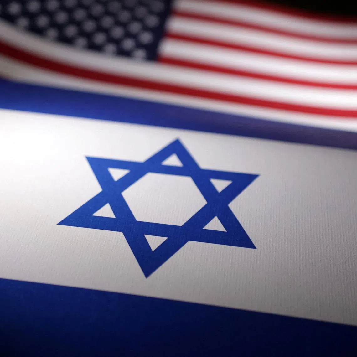 Israeli and U.S. flags are seen in this illustration taken, April 24, 2024. REUTERS/Dado Ruvic/Illustration