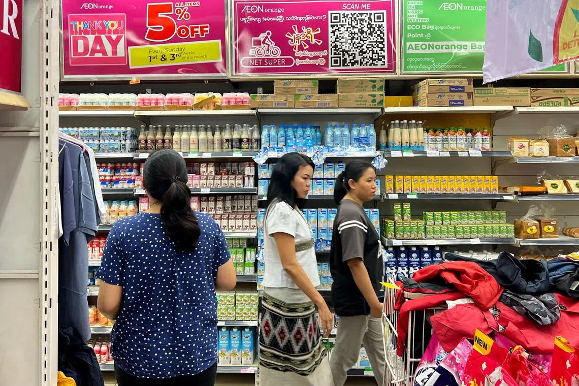 Shoppers visit an Aeon Orange supermarket in Yangon on July 1, 2024. Myanmar authorities have arrested a Japanese national working for retail giant Aeon for allegedly selling rice at artificially high prices, the junta said, with Tokyo demanding his immediate release. (Photo by AFP)