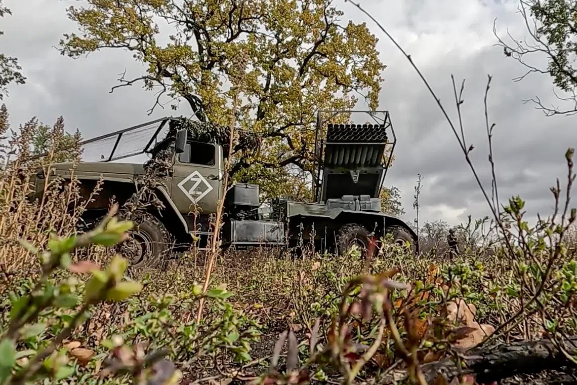A Russian serviceman operating a rocket launcher during Moscow's invasion of Ukraine.