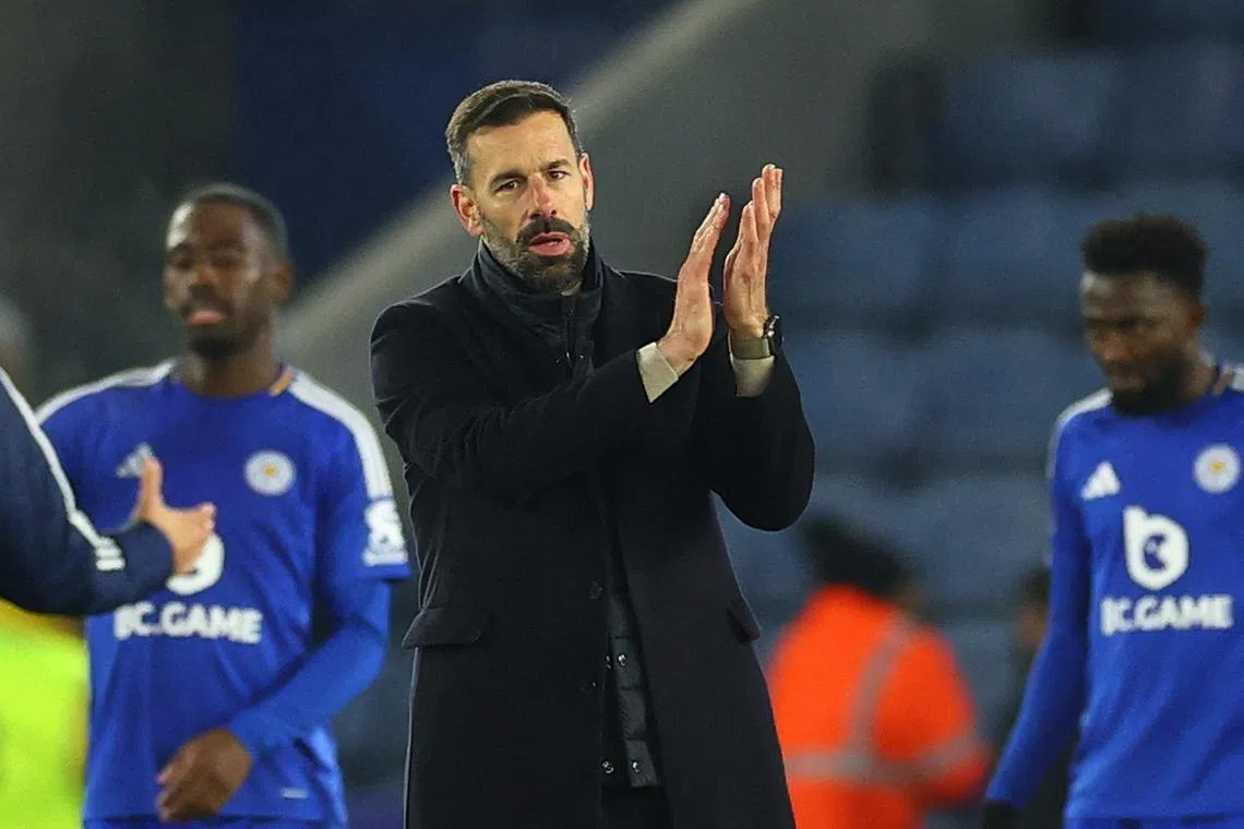 Leicester City manager Ruud van Nistelrooy celebrates after the match.