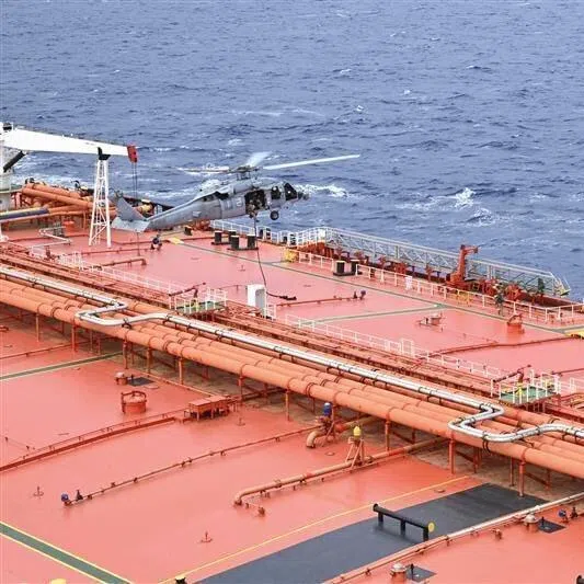 The US Department of Defence posted video footage showing helicopters landing on a large, bright orange tanker.
