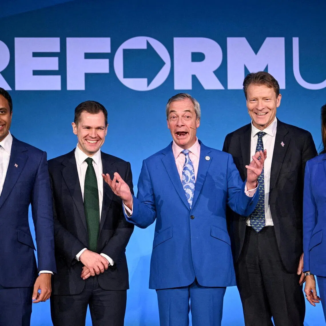 Mr Nigel Farage's (centre) populist Reform party in 2025 became the first British party to announce it would accept bitcoin donations. At least two-thirds of its money raised came from donors abroad.