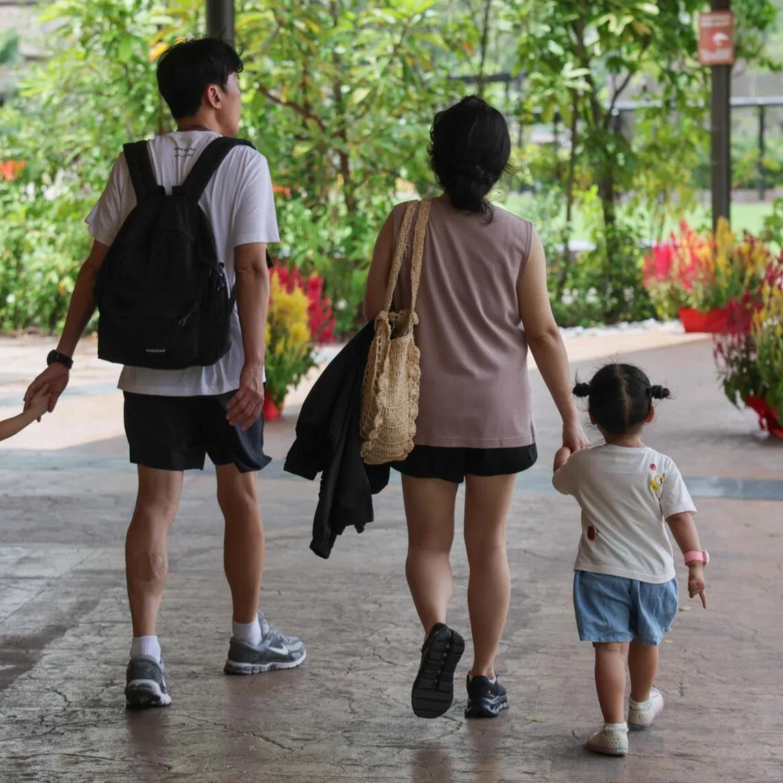 ST20260227_202668400983: Gin Tay/ ectoy/ Elisa Chia YL/
Generic photo of a family at Mandai Wildlife Reserve on Feb 27, 2026.
Can use for stories on family life, cost of living, leisure, retail  weekend crowds, parenting, urban liveability, children, childcare, parents, Singapore zoo, mandai zoo

