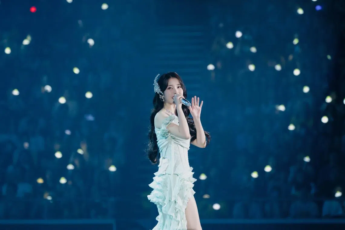 South Korean singer IU performing during her 2024 IU H.E.R. World Tour Concert In Singapore show at the Singapore Indoor Stadium, on April 20.