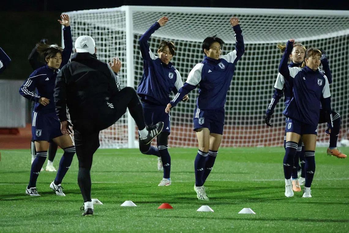 Japanese players warm up during a training session in Wellington, on the eve of the Women's World Cup last-16 clash with Norway.