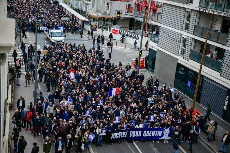 Protesters attend a march in tribute to far-right activist Quentin Deranque in Lyon on Feb 21, 2026.