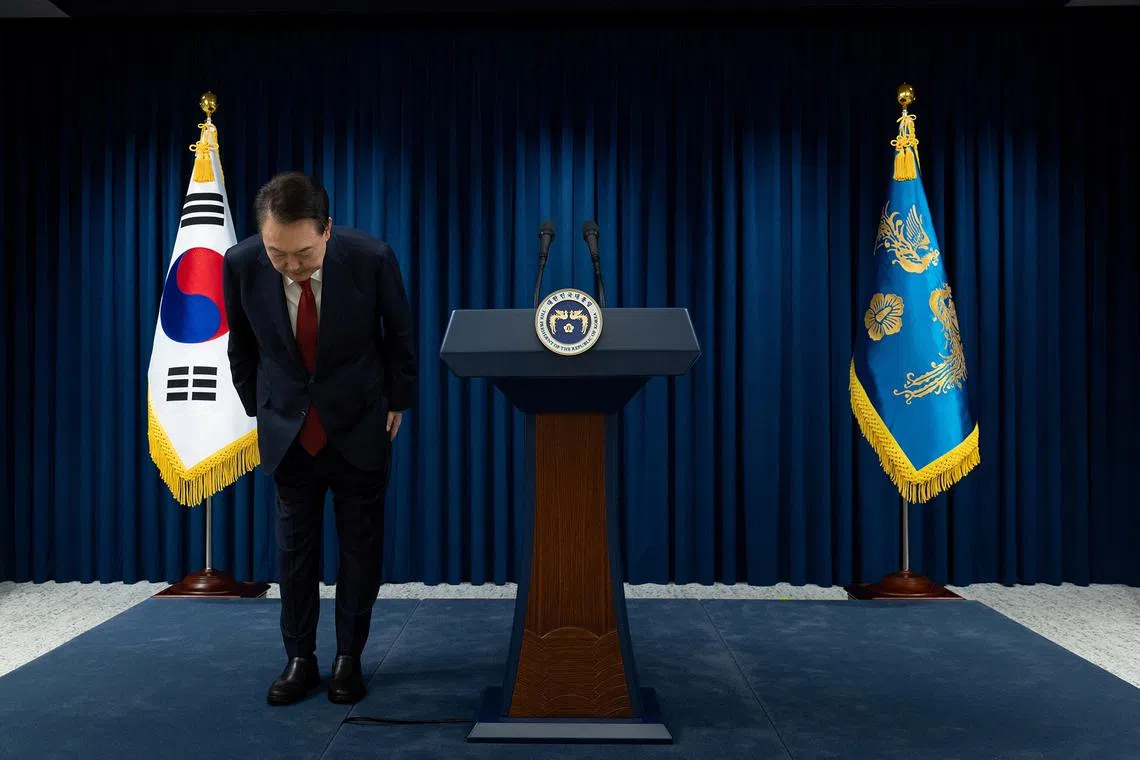 South Korean President Yoon Suk Yeol bows while delivering an address to the nation at the Presidential Office in Seoul, South Korea, December 7, 2024. The Presidential Office/Handout via REUTERS ATTENTION EDITORS - THIS IMAGE HAS BEEN SUPPLIED BY A THIRD PARTY.