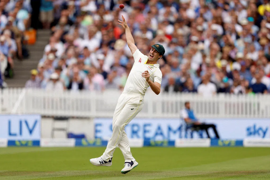 Cricket - Ashes - Second Test - England v Australia - Lords, London, Britain - June 30, 2023 Australia's Pat Cummins takes a catch to dismiss England's Harry Brook off the bowling of Mitchell Starc Action Images via Reuters/Peter Cziborra