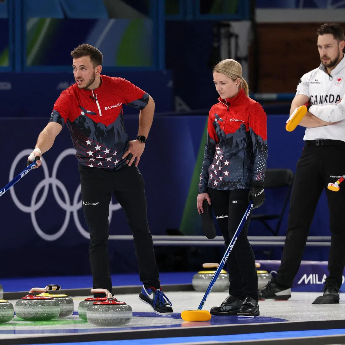 Milano Cortina 2026 Olympics - Curling - Mixed Doubles Round Robin Session 5 - United States of America vs Canada - Cortina Curling Olympic Stadium, Cortina d'Ampezzo, Italy - February 06, 2026. Korey Dropkin of United States and Cory Thiesse of United States look on during their match against Brett Gallant of Canada and Jocelyn Peterman of Canada REUTERS/Issei Kato