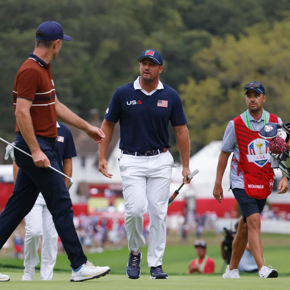 Golf - The 2025 Ryder Cup - Bethpage Black Golf Course, Farmingdale, New York, United States - September 27, 2025 Team Europe's Justin Rose and Team USA's Bryson DeChambeau argue on the 15th green during the four-balls IMAGN IMAGES via Reuters/Peter Casey