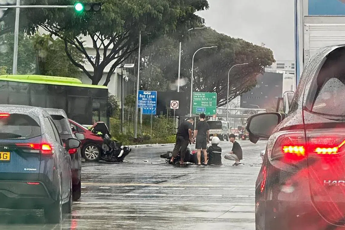 Videos of the aftermath of the accident showed a motorcycle on the ground between a car and a minibus.