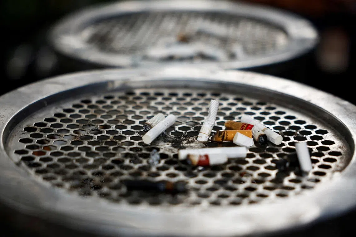 FILE PHOTO: Cigarette butts are seen on the ashtray in Jakarta, Indonesia, May 31, 2024. REUTERS/Willy Kurniawan/File Photo