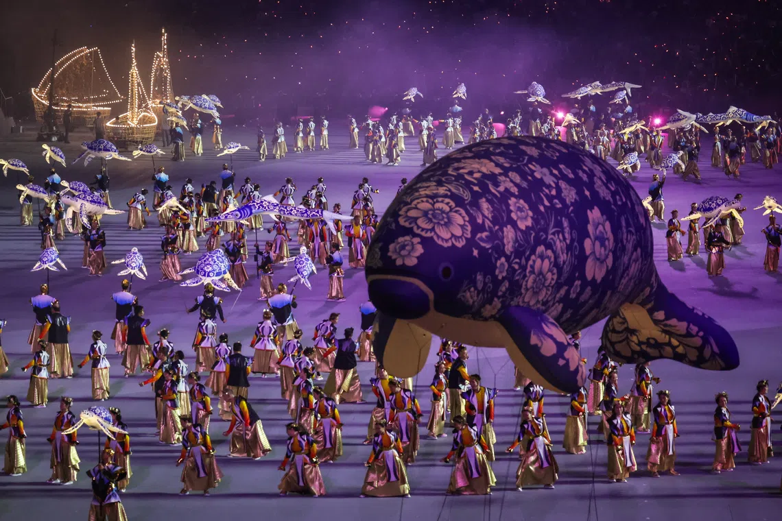 Performers from Soka Gakkai Singapore performing alongside marine animal puppets during Chapter 3 of National Day Parade 2026 at the National Stadium on Aug 9, 2026.