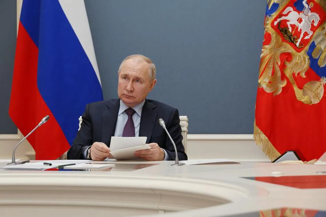 Russian President Vladimir Putin attends a ceremony for nuclear fuel loading at the Akkuyu nuclear power plant, which is under construction in Turkey, via video link in Moscow, Russia April 27, 2023. Sputnik/Mikhail Klimentyev/Kremlin via REUTERS/File Photo