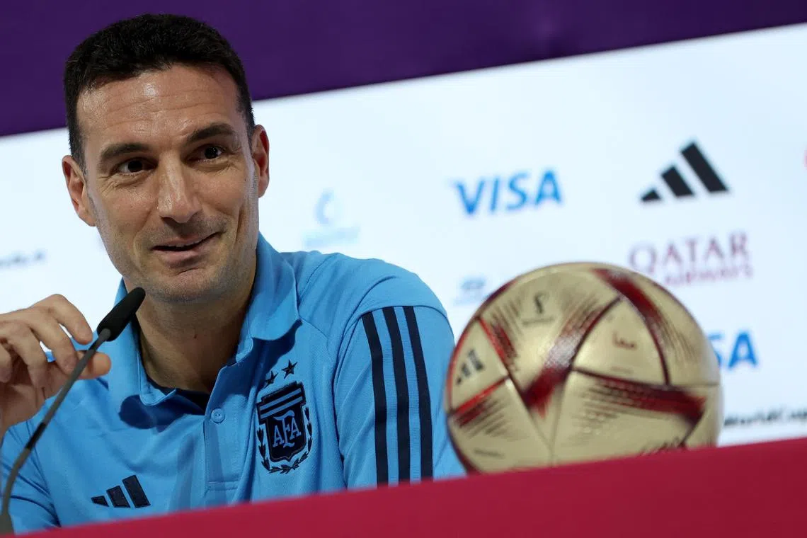 Argentina coach Lionel Scaloni strikes a confident pose during a press conference ahead of Tuesday's World Cup semi-final against Croatia. 