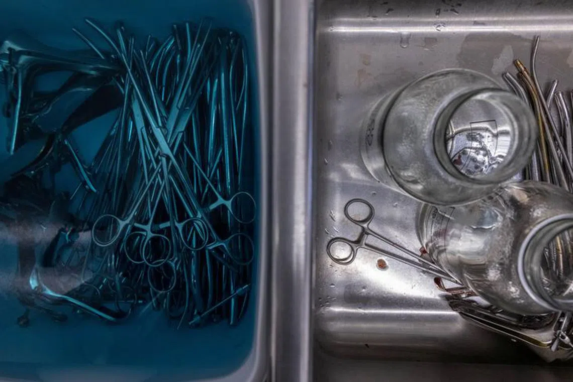 FILE PHOTO: Medical instruments are sterilized following a surgical abortion at Trust Women clinic in Oklahoma City, U.S., December 6, 2021. Picture taken December 6, 2021.  REUTERS/Evelyn Hockstein