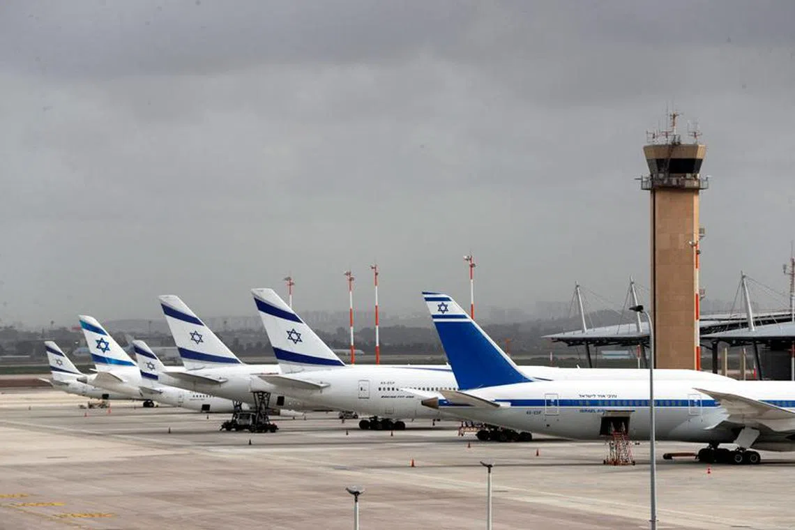 FILE PHOTO: El Al Israel Airlines planes are seen on the tarmac at Ben Gurion International airport in Lod, near Tel Aviv, Israel March 10, 2020. REUTERS/Ronen Zvulun/File Photo