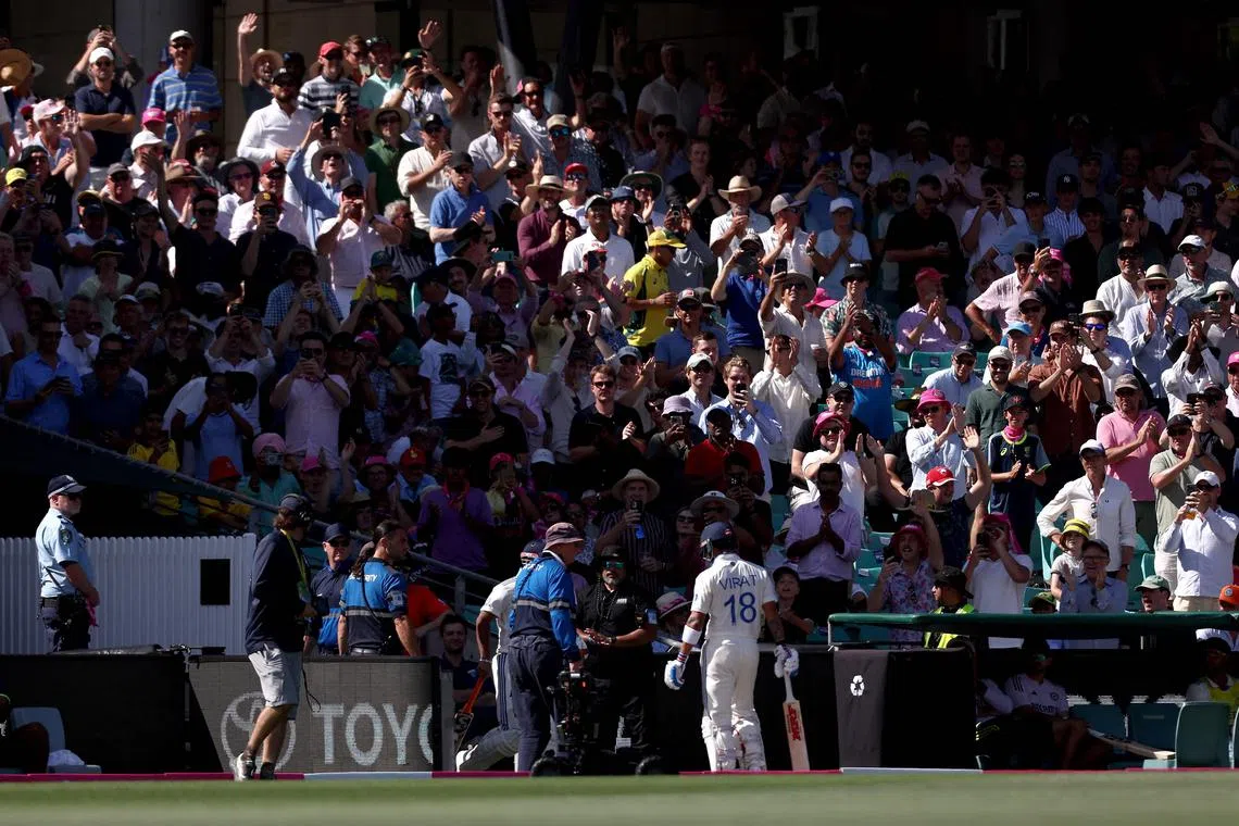 India’s Virat Kohli, who had a poor tour of Australia, finds his  (C) walks off the ground after being dismissed by Australia’s Scott Boland during day two of the fifth cricket Test match between Australia and India at The SCG in Sydney on January 4, 2025. (Photo by DAVID GRAY / AFP) / -- IMAGE RESTRICTED TO EDITORIAL USE - STRICTLY NO COMMERCIAL USE --