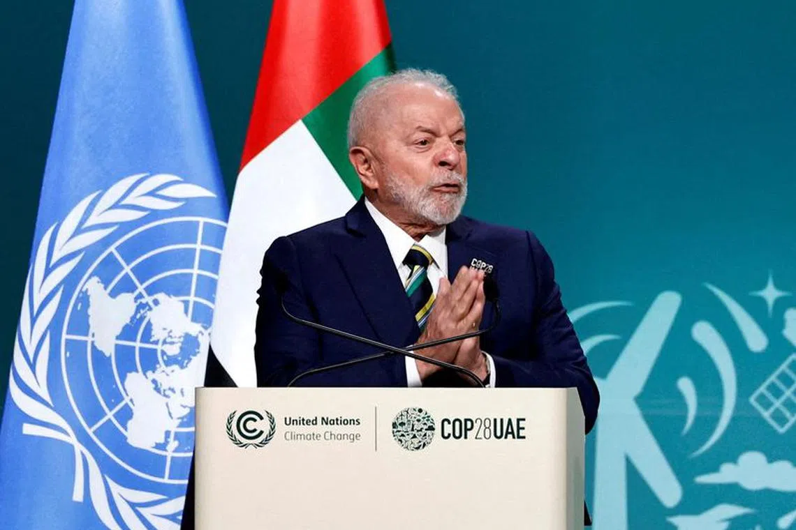 FILE PHOTO: Brazil's President Luiz Inacio Lula da Silva delivers a national statement at the World Climate Action Summit during the United Nations Climate Change Conference (COP28) in Dubai, United Arab Emirates, December 1, 2023. REUTERS/Thaier Al Sudani/File Photo