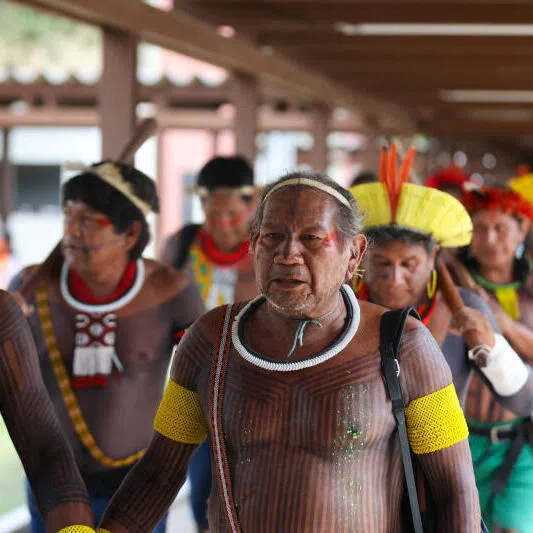 Indigenous people arrive at the Indigenous Camp on the day of the opening ceremony of COP30, in Belem, Brazil, on Nov 10.