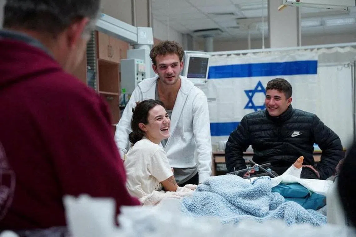 FILE PHOTO: Itay Regev, 18, is reunited with his sister Maya Regev, 21, shortly after his arrival in Israel after being held hostage by the Palestinian militant group Hamas in the Gaza Strip, at Soroka Medical Center in Beersheba, Israel, in this handout image obtained by Reuters on November 30, 2023. Maya was also held hostage in Gaza and was released days before Itay. Prime Minister's Office/handout via Reuters/File Photo