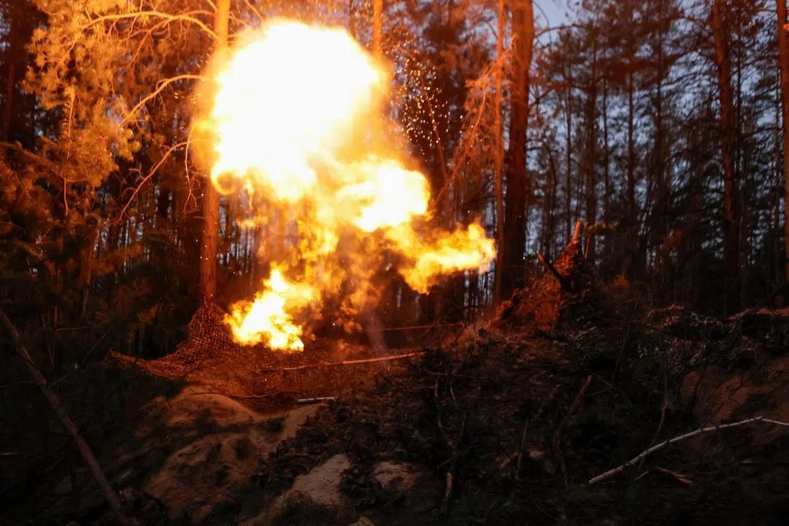 FILE PHOTO: Service members of the 115th Separate Mechanized Brigade of the Ukrainian Armed Forces fire a mortar towards Russian troops, at a position in a front line, amid Russia's attack on Ukraine, in Donetsk region, Ukraine May 16, 2025. REUTERS/Sofiia Gatilova/File Photo