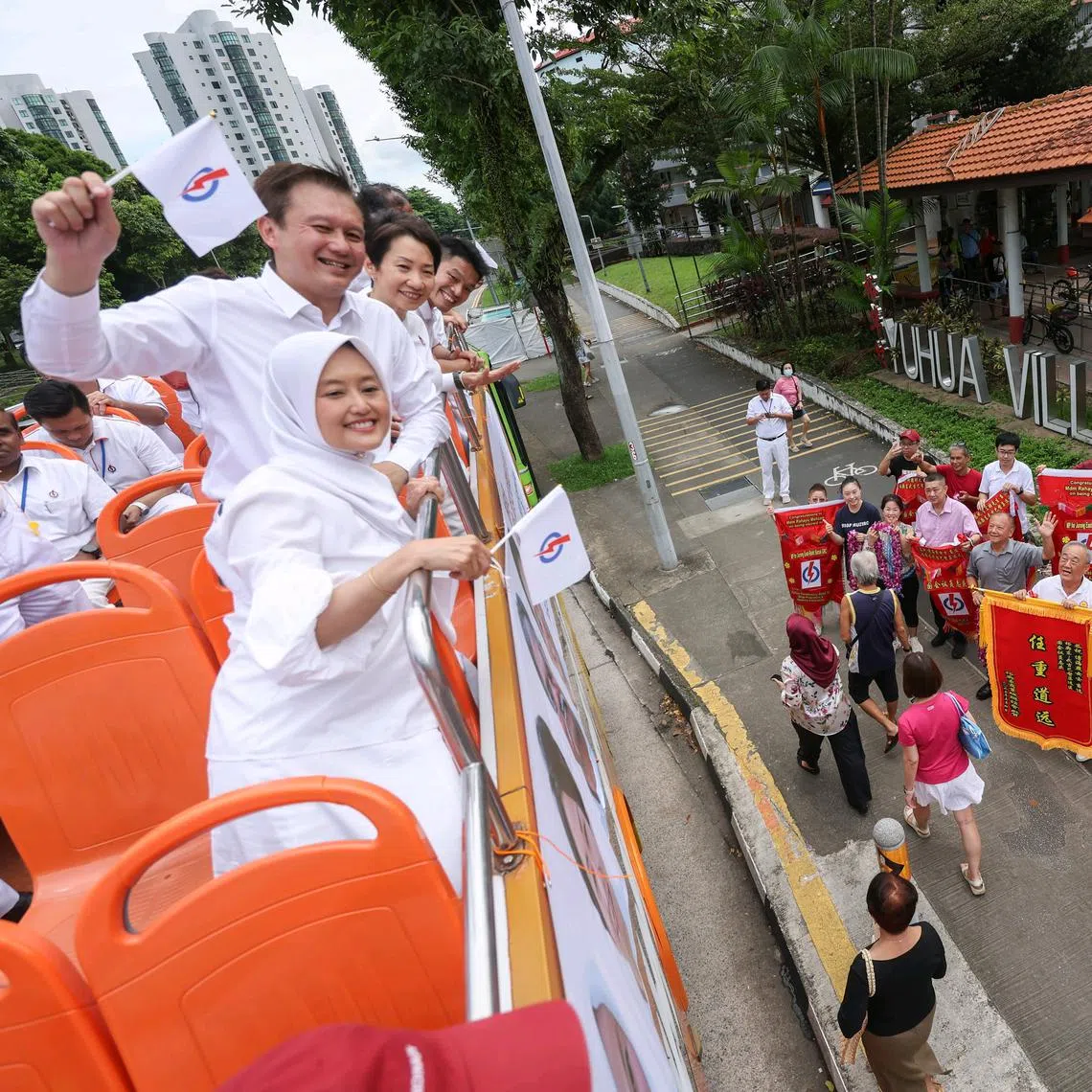 ST20250504_202527600561/mnjebb04/ajvictory04/Brian Teo/Michelle Ng ZY/(From Left) PAP's elected MPs for Jurong East-Bukit Batok GRC Rahayu Mahzam, Lee Hong Chuang, Grace Fu, David Hoe, and Murali Pillai (not pictured) greeting residents at Yuhua Village on May 4, 2025. ST PHOTO: BRIAN TEO