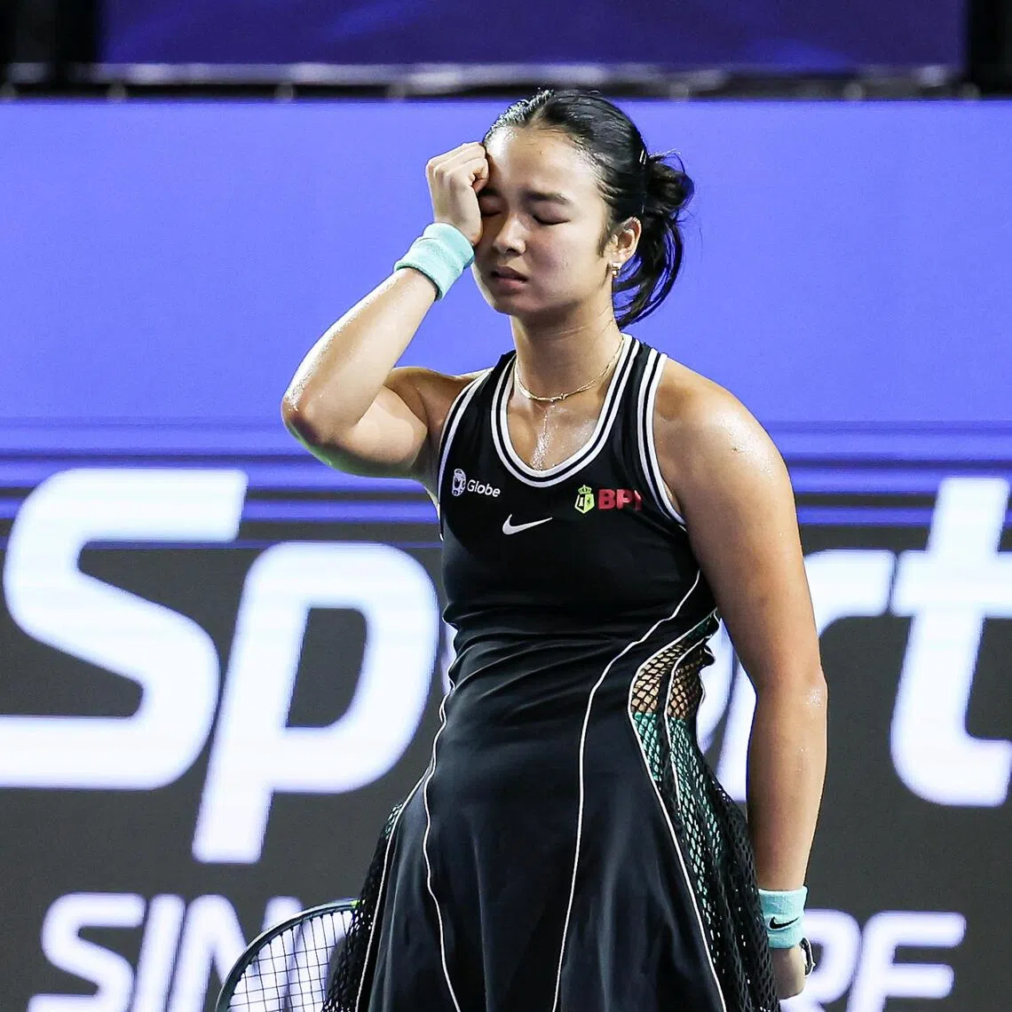 A dejected Alexandra Eala during her shock loss to Tatiana Prozorova in last week’s Singapore Tennis Open. She was upset again by a lower-ranked player in the Asian Games semi-finals on Oct 1.