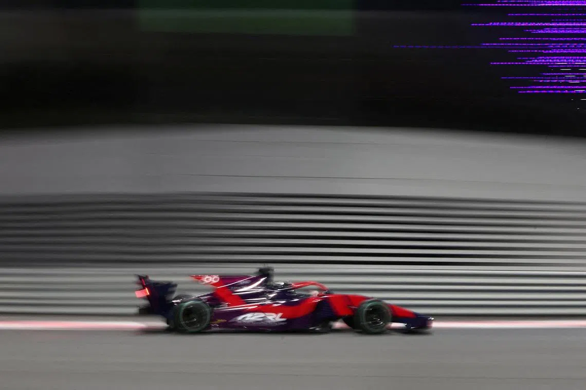 FILE PHOTO: Former F1 driver Daniil Kvyal races against a TII driverless car at the Abu Dhabi Autonomous Racing League, in Abu Dhabi, United Arab Emirates, April 27, 2024. REUTERS/Amr Alfiky/File Photo