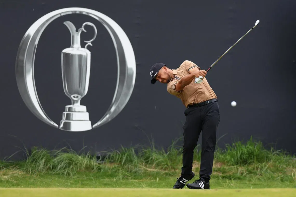 Golf - The 153rd Open Championship - Royal Portrush Golf Club, Portrush, Northern Ireland, Britain - July 19, 2025 Xander Schauffele of the U.S. hits his tee shot on the 1st hole during the third round REUTERS/Russell Cheyne