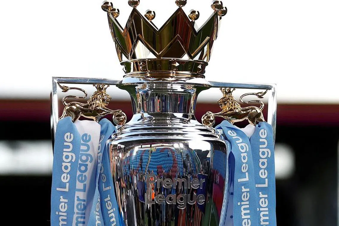 FILE PHOTO: Soccer Football - Premier League - Burnley v Manchester City - Turf Moor, Burnley, Britain - August 11, 2023 General view of the Premier League trophy before the match Action Images via Reuters/Jason Cairnduff/File Photo