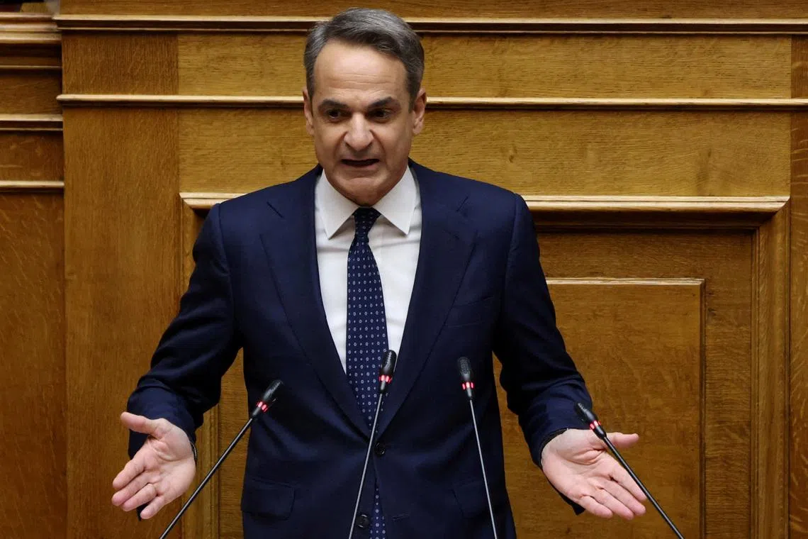 FILE PHOTO: Greek Prime Minister Kyriakos Mitsotakis speaks at the Greek parliament as parliament votes on the 2026 budget, in Athens, Greece, December 16, 2025. REUTERS/Louiza Vradi/File Photo