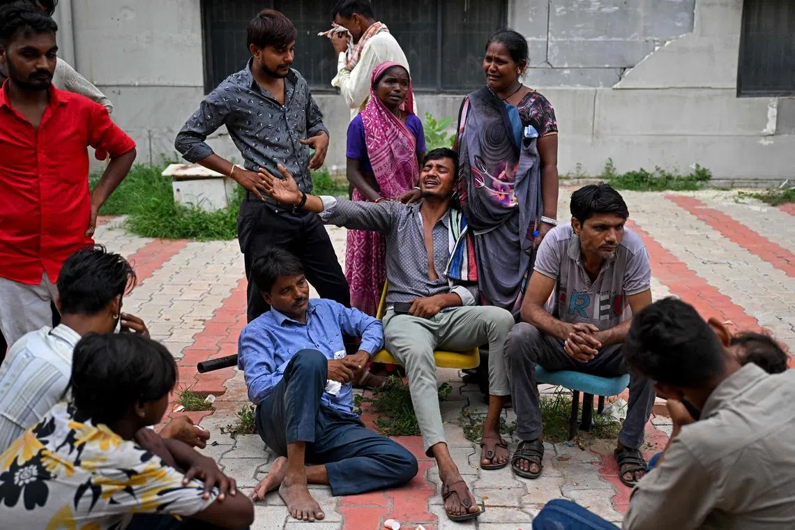 Family members and friends mourned as at least 265 passengers were killed in the June 12 Air India crash.