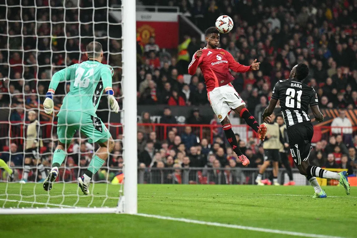 Amad Diallo scores the first of his two goals for Manchester United.