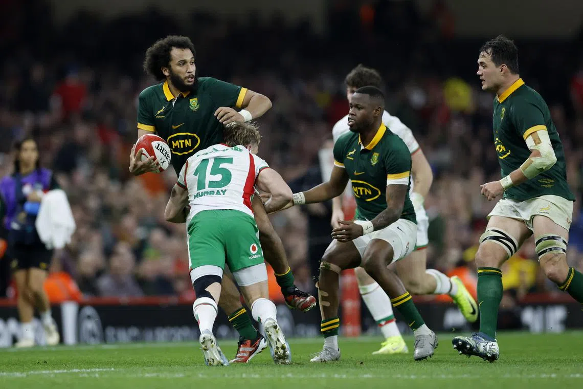 Rugby Union - Autumn Internationals - Wales v South Africa - Principality Stadium, Cardiff, Wales, Britain - November 23, 2024 South Africa's Jaden Hendrikse in action with Wales' Blair Murray Action Images via Reuters/Peter Cziborra/File Photo