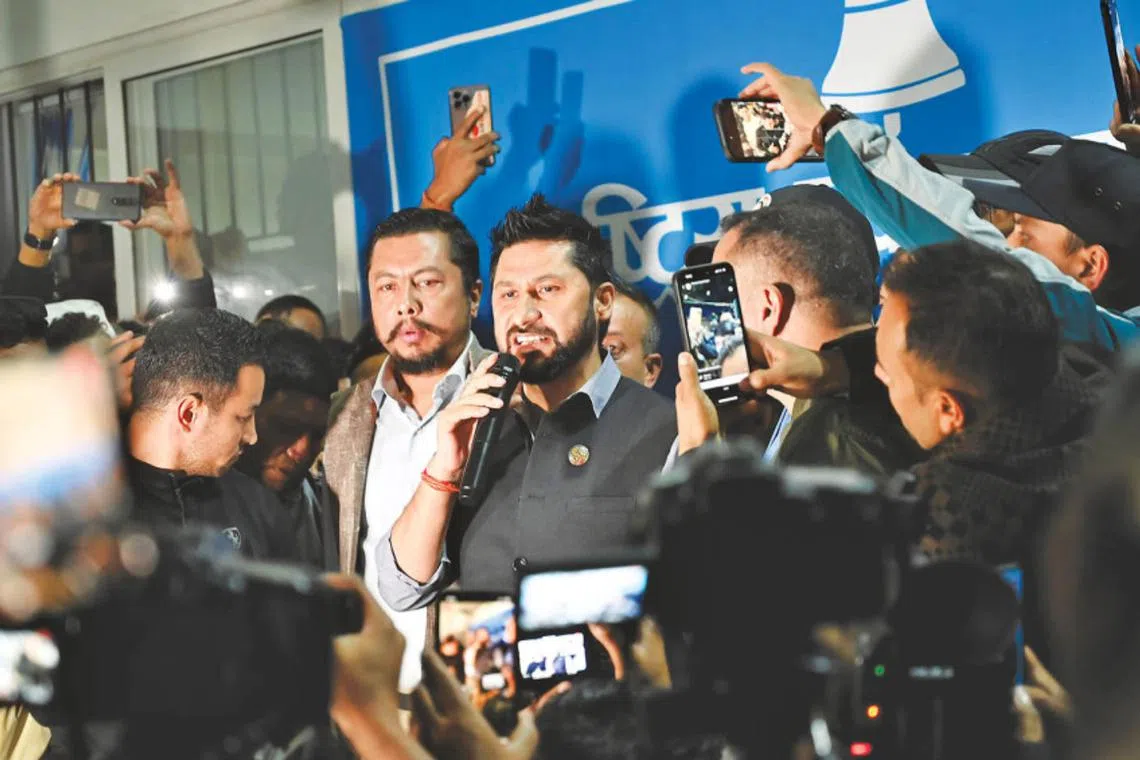 Rastriya Swatantra Party chief Rabi Lamichhane speaking to the media before his arrest on Oct 18.