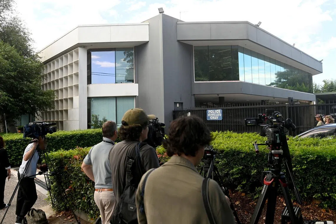 Members of the media wait outside Mascot Police Station after former SAS soldier Ben Roberts-Smith was charged with alleged war crimes committed in Afghanistan, in Sydney, Australia, April 7, 2026. REUTERS/Jeremy Piper
