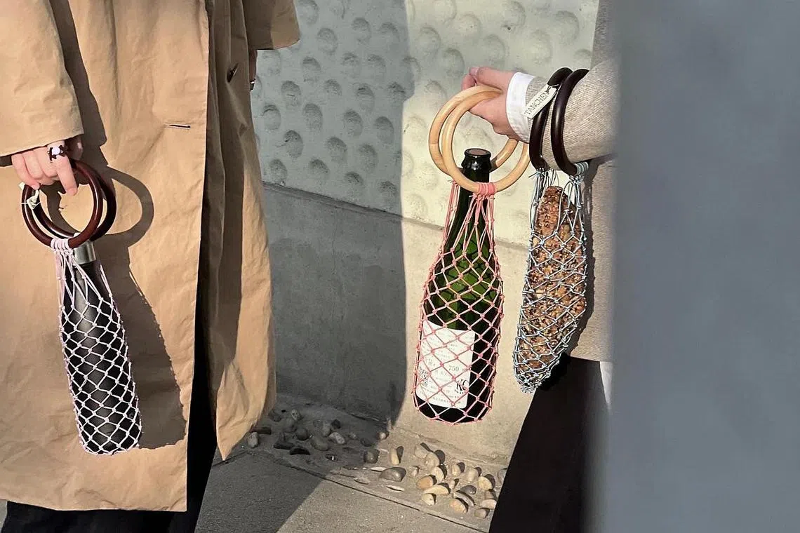 Tanchen Studio's original 0/0 Bags are a stylish way to carry wine around.