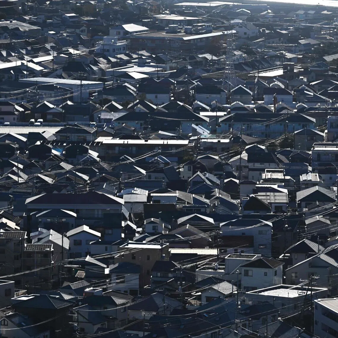 While factory output waned slightly in December from November, demand for goods fell at the slowest rate in a year and a half.