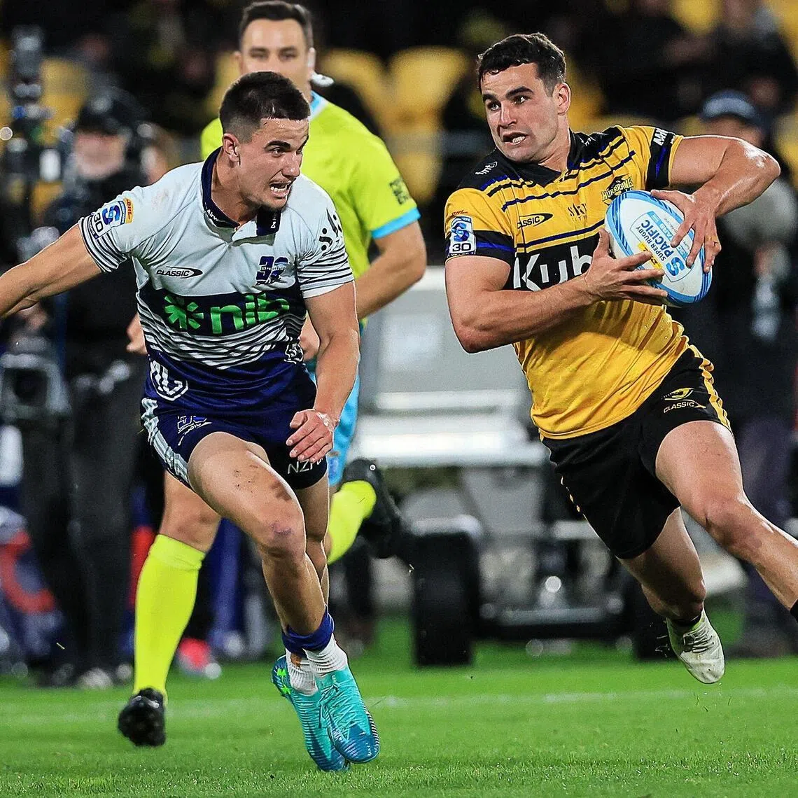 Wellington Hurricanes' Josh Moorby trying to get past Auckland Blues' Payton Spencer in their Super Rugby Pacific semi-final in Wellington on June 13, 2026.