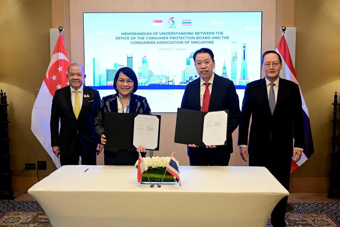Singapore’s Second Minister for Trade and Industry Tan See Leng (far right) and Thailand’s Minister of Commerce Pichai Naripthaphan (far left) witnessing the signing of a MOU on March 14.
