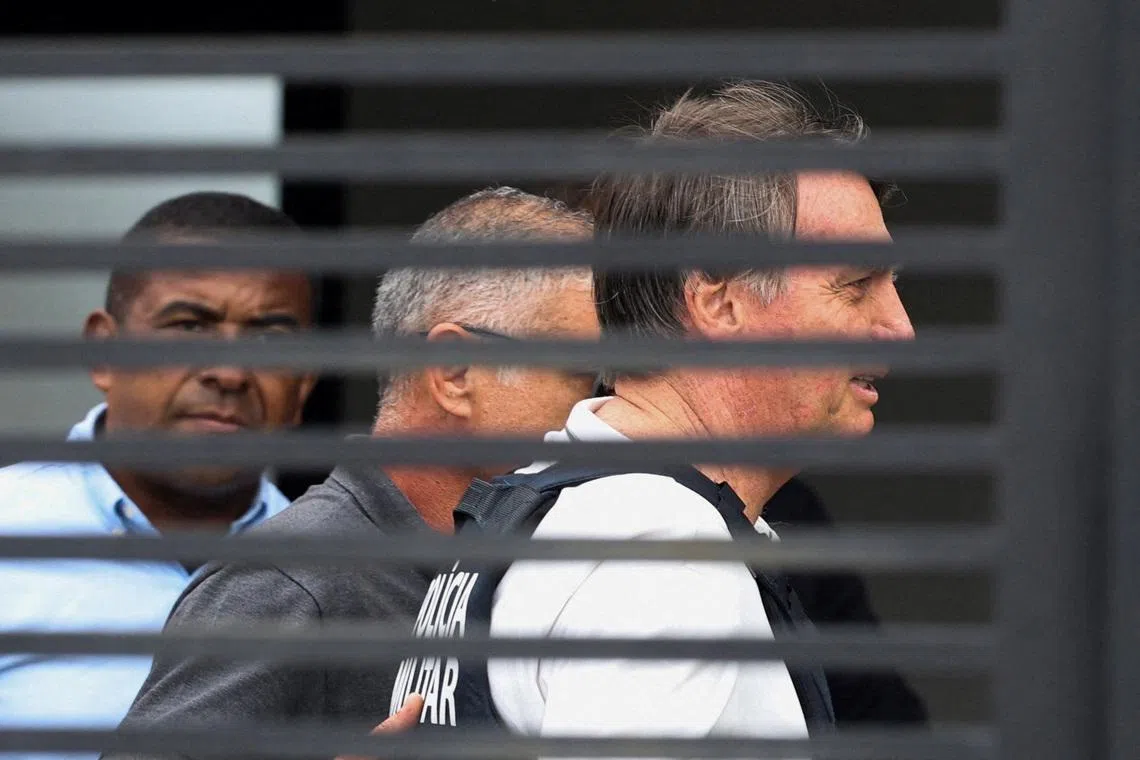Former Brazilian president Jair Bolsonaro arrives home to begin serving house arrest, under an initial 90-day regime authorised on medical grounds, in Brasilia on March 27.