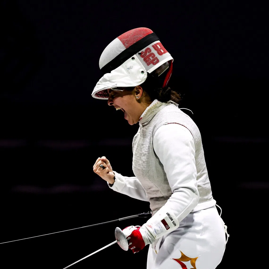 Amita Berthier (above) defeated compatriot Maxine Wong 15-4 to win the women’s individual foil title.
