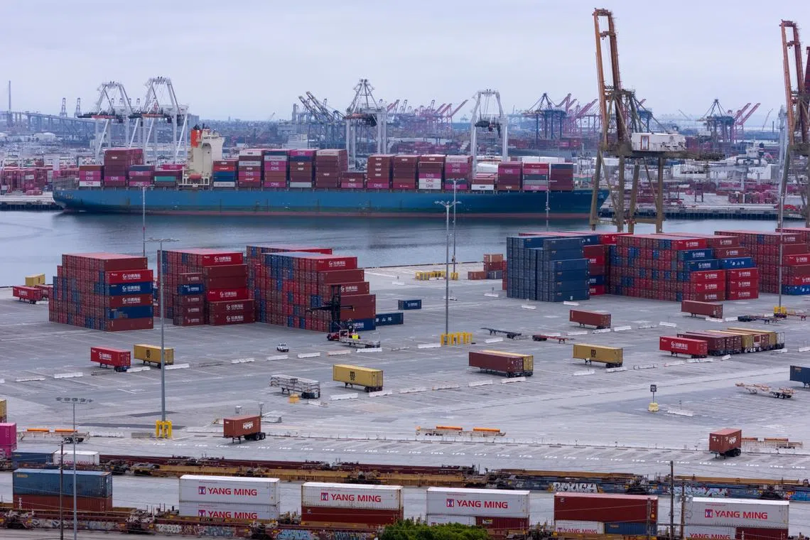 FILE PHOTO: A drone view shows shipping containers from China at the Port of Los Angeles, in San Pedro, California, U.S., May 1, 2025. REUTERS/Mike Blake/File Photo